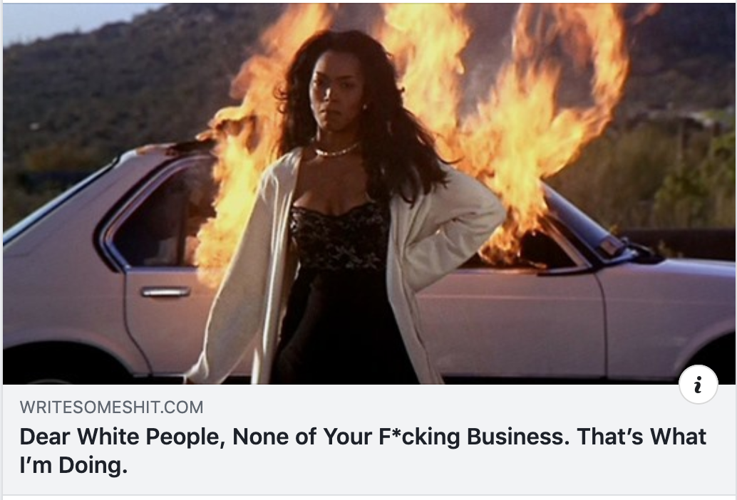 website header, Black woman standing defiantly in front of a burning car