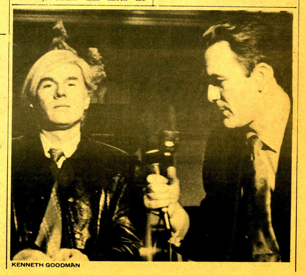 An uncooperative Andy Warhol meets with a local television reporter during the exhibition's press preview.(Photo by Kenneth Goodman, The Phoenix)