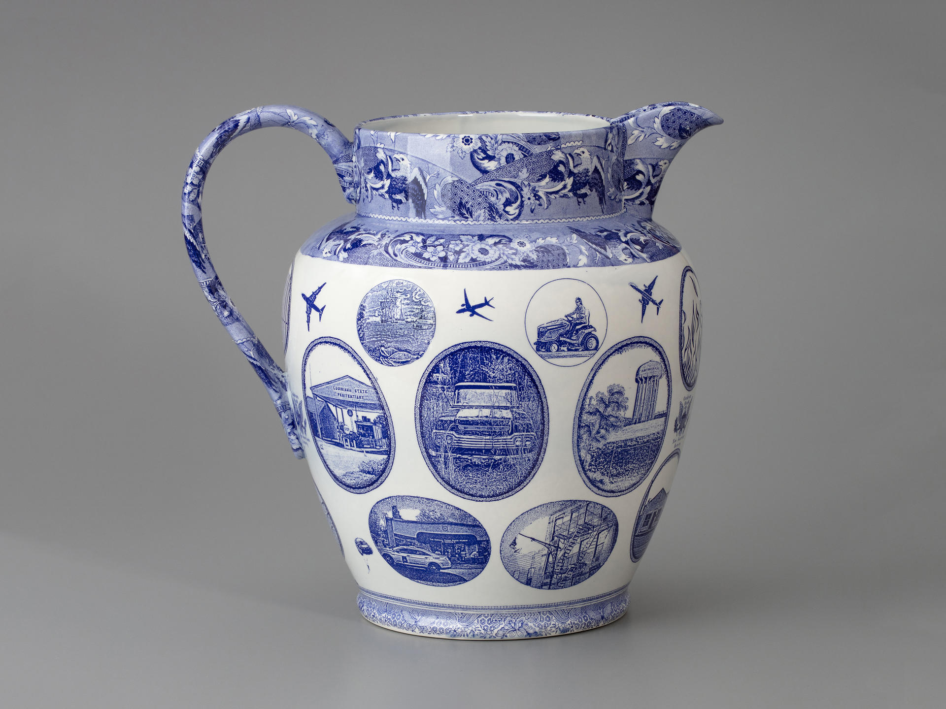 blue and white transferware jug with many vignettes