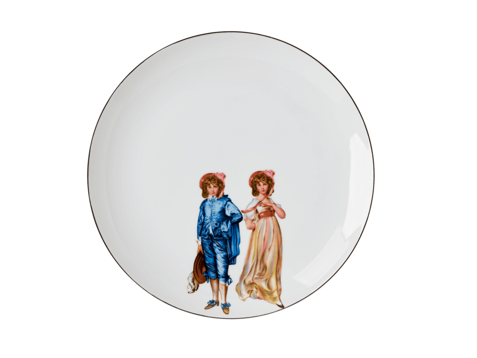 A white ceramic plate with an illustration of Victorian-style twins 