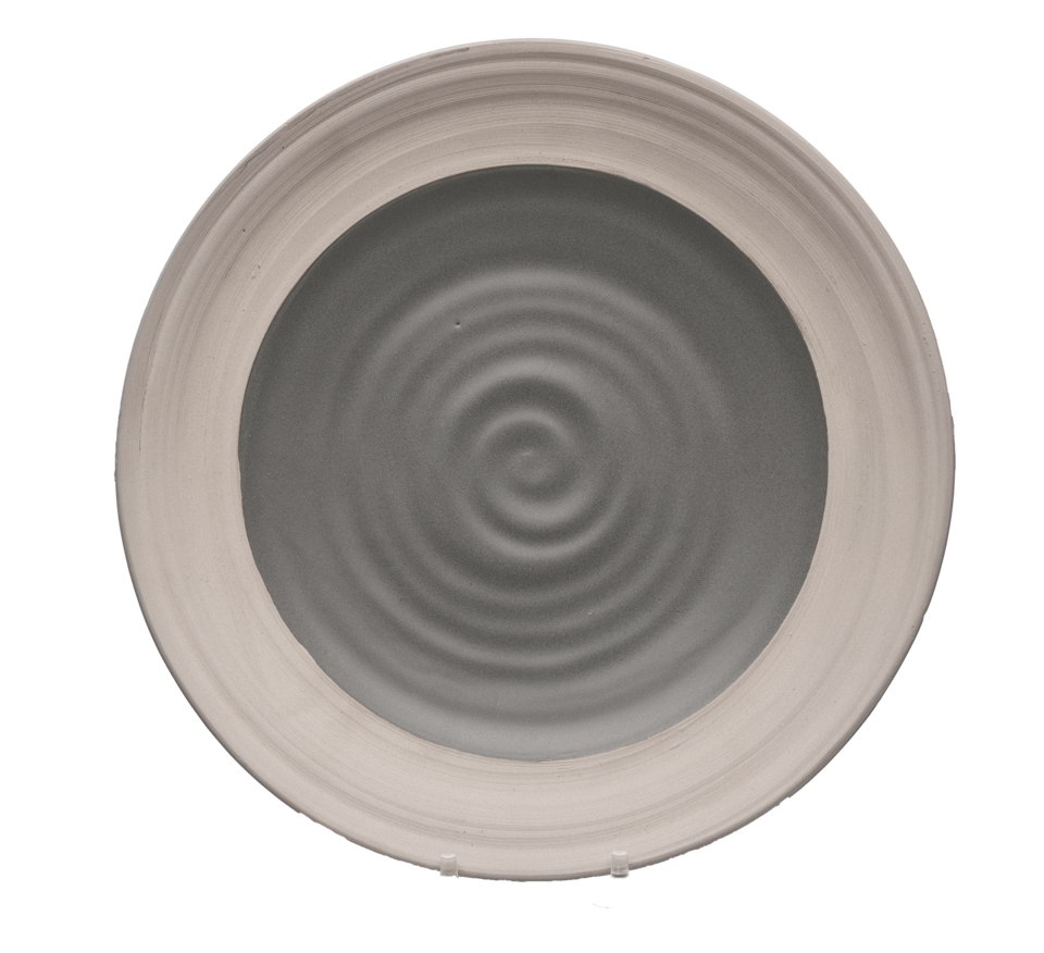 A circular plate with a spiraling dark grey center and a wide light gray rim.