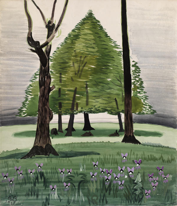Violets in green foreground, two bare tree trunks in middle distance, trees with foliage on lighter green ground, background and sky, lavender.